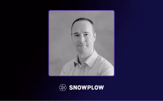Black and white portrait of a man in a collared shirt above the Snowplow company logo.
